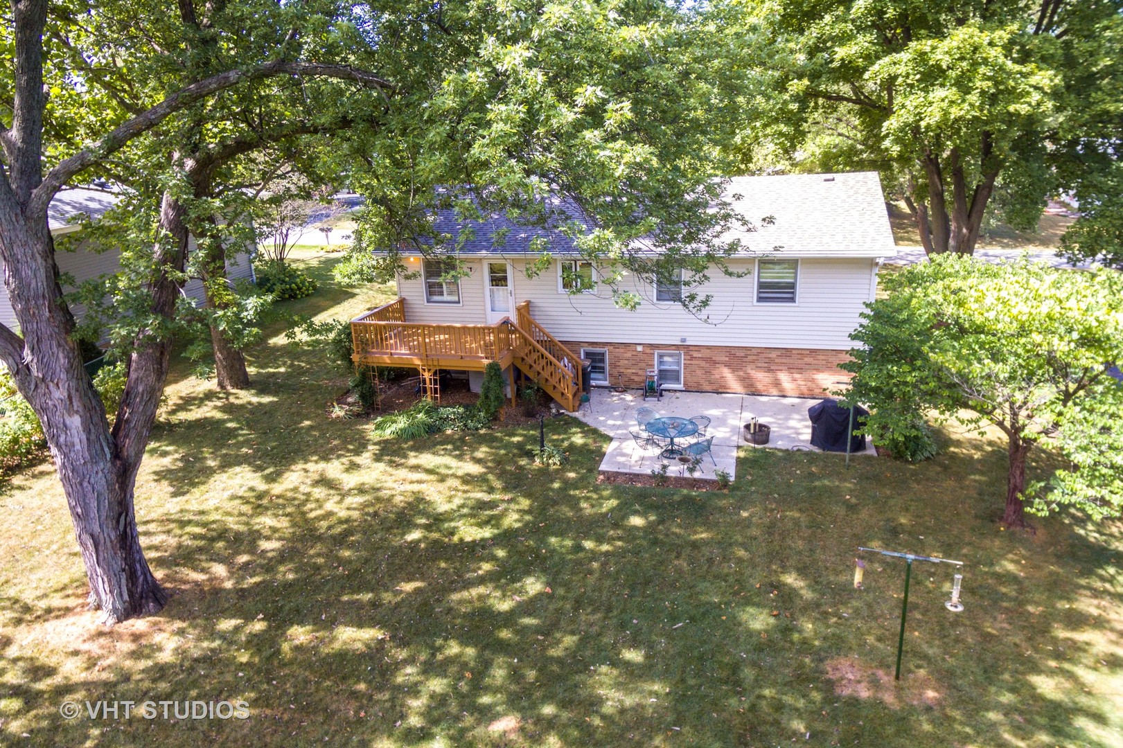N255 Peter Road Winfield, IL 60190 - Photo 29 of 29 a view of a house with a yard porch and sitting area