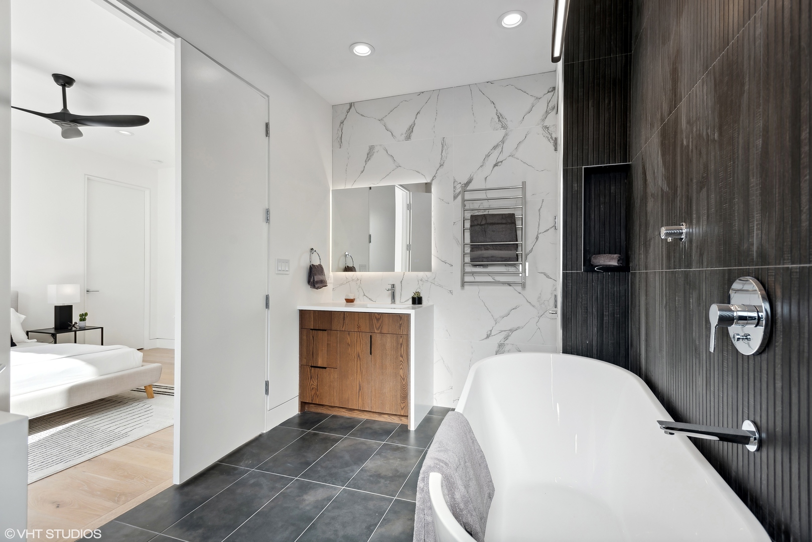 Undisclosed Address Chicago, IL 60657 - Photo 18 of 39 a en suite bathroom with a sink and a mirror