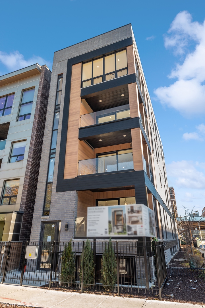 Undisclosed Address Chicago, IL 60657 - Photo 2 of 39 a front view of a house