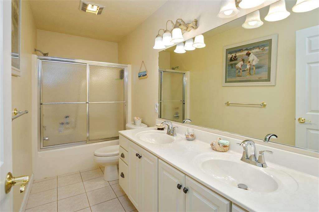 216 Locust Valley Road Greensburg, PA 15601 - Photo 23 of 32 a bathroom with a double vanity sink mirror and toilet