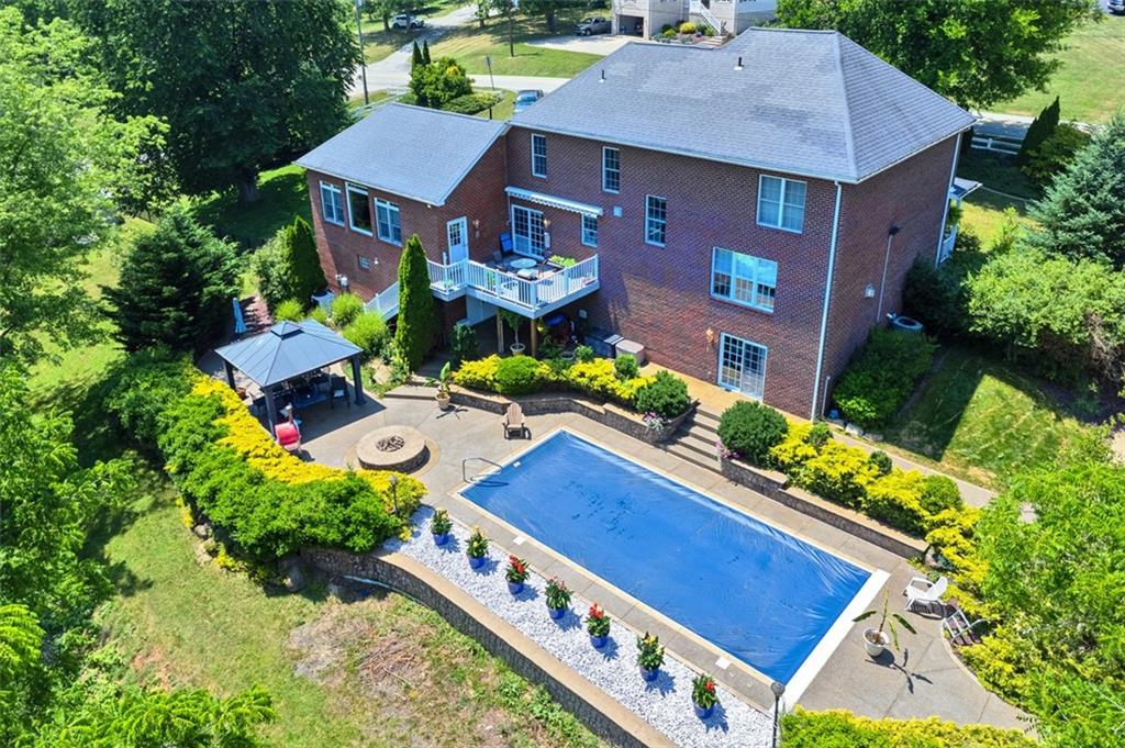 216 Locust Valley Road Greensburg, PA 15601 - Photo 5 of 32 an aerial view of a house with a yard