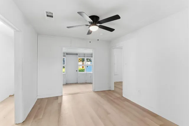 a view of an empty room and window