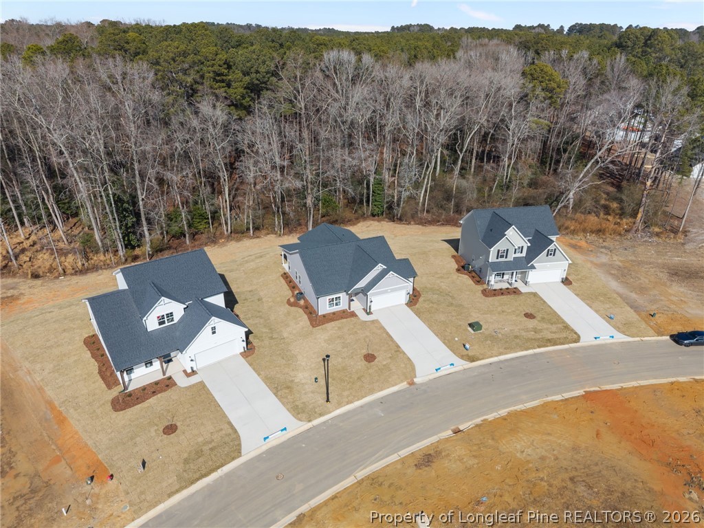 151 Michter Street Vass, NC 28394 - Photo 13 of 47 an aerial view of a house with pool