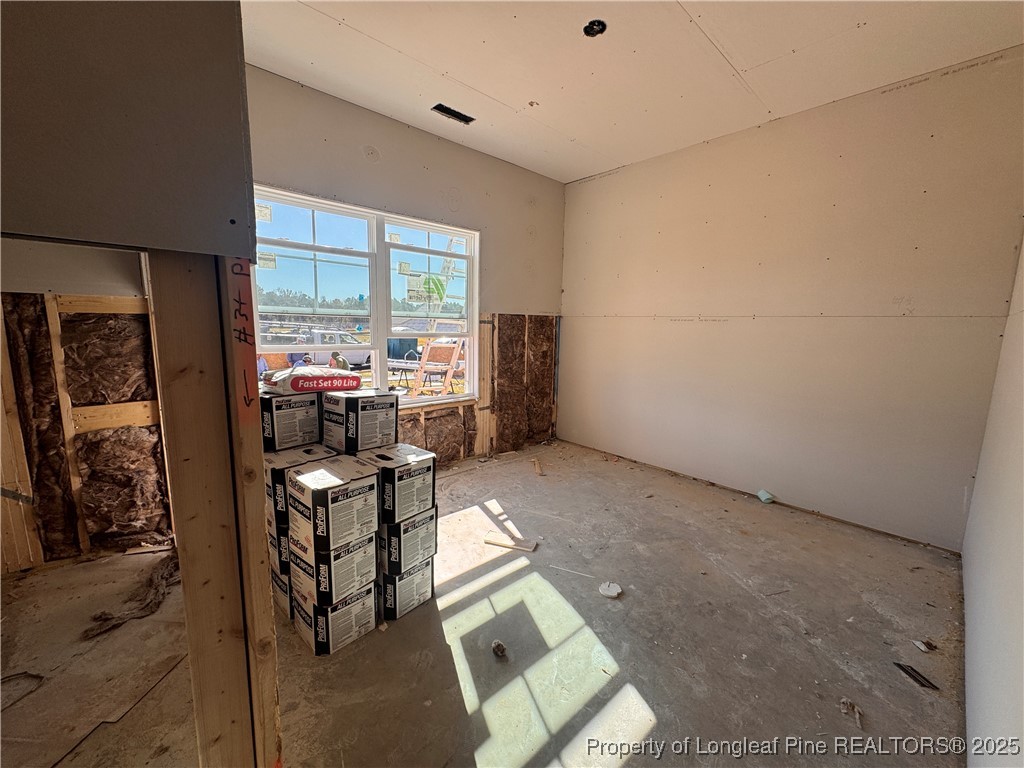 151 Michter Street Vass, NC 28394 - Photo 3 of 13 a living room with furniture and a large window