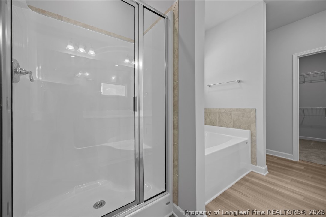151 Michter Street Vass, NC 28394 - Photo 39 of 47 a bathroom with a bathtub and shower