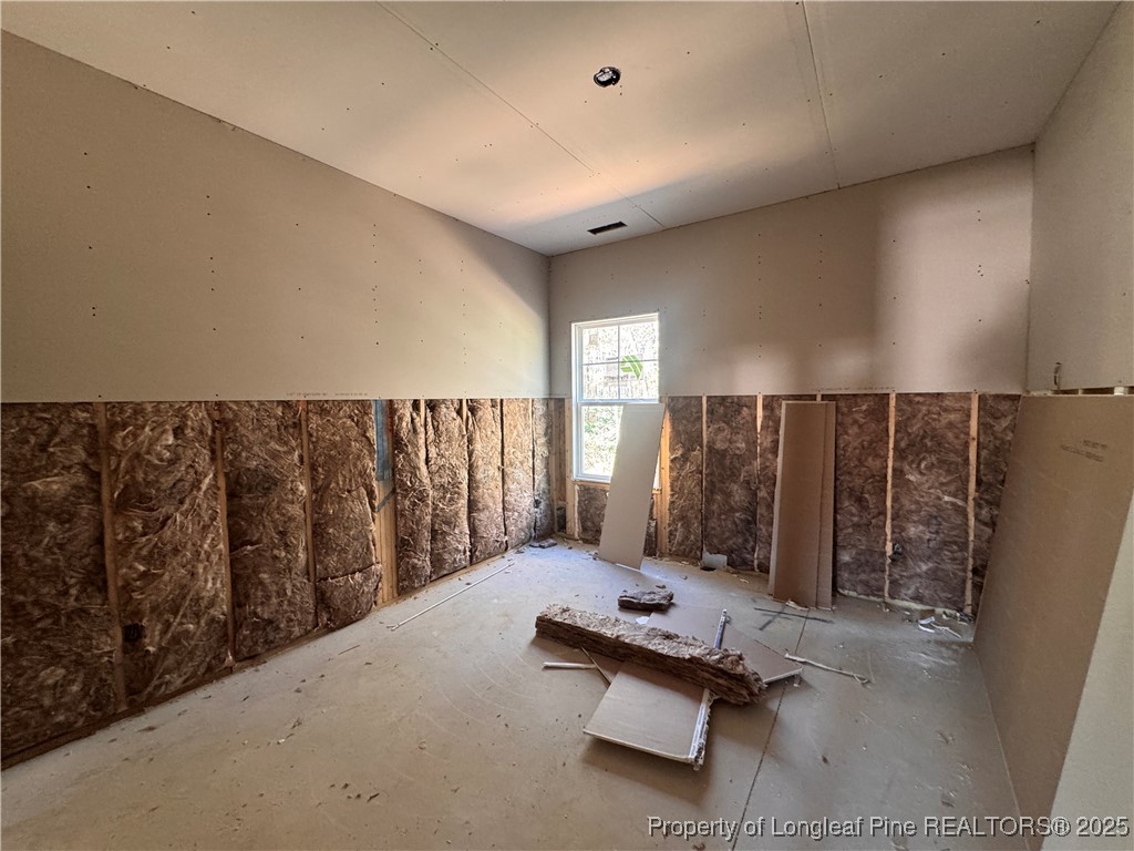 151 Michter Street Vass, NC 28394 - Photo 8 of 13 a view of a room with gym equipment