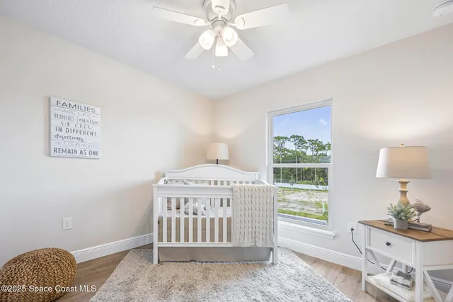 a view of small space with wooden floor
