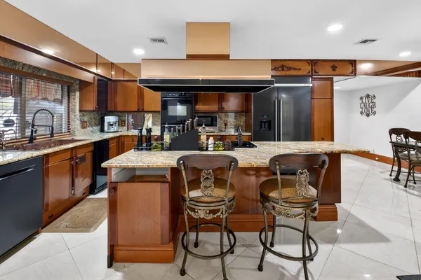 $10,000 | 10965 La Reina Road, Delray Beach, FL 33446