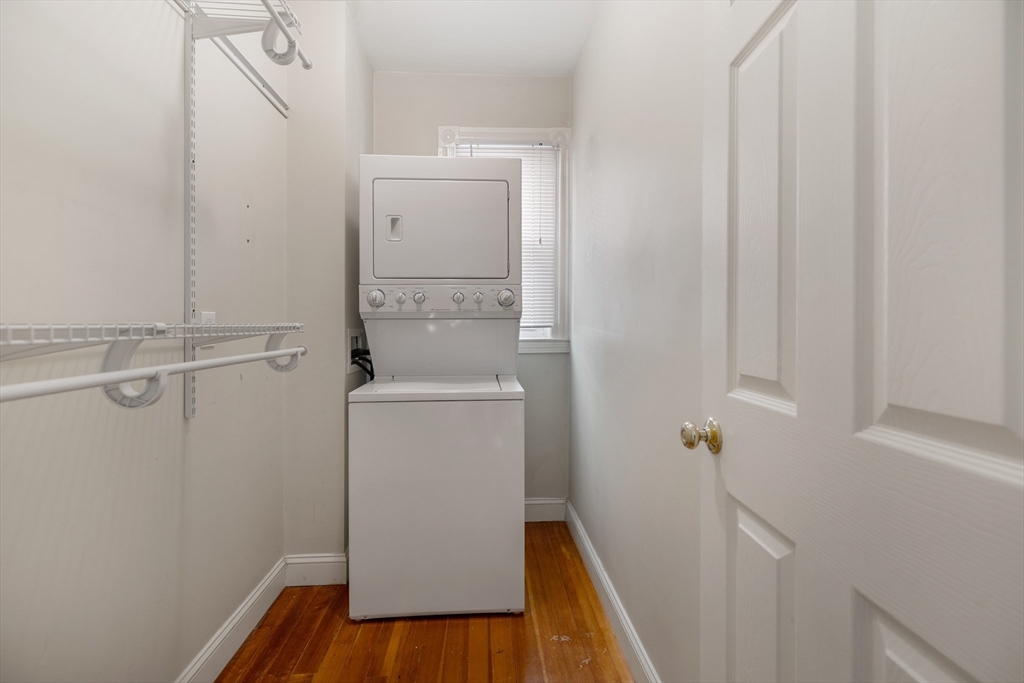 41-43 White Place Brookline, MA 02445 - Photo 8 of 14 a room with a washer and dryer
