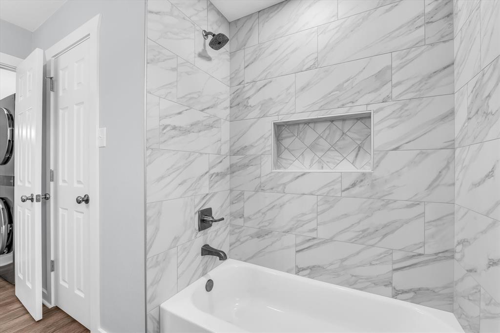 3608 North 26th Street Waco, TX 76708 - Photo 19 of 28 a bathroom with a bathtub
