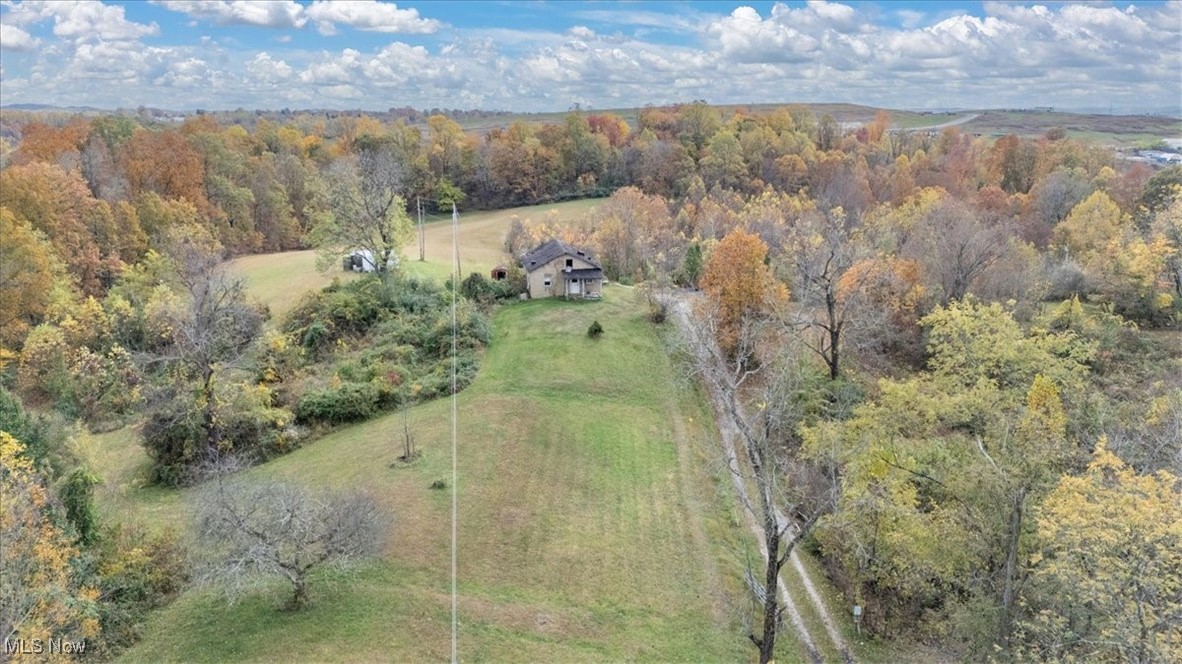 861 Roth Road Parkersburg, WV 26104 - Photo 12 of 20 Aerial overview of property's location featuring a heavily wooded area