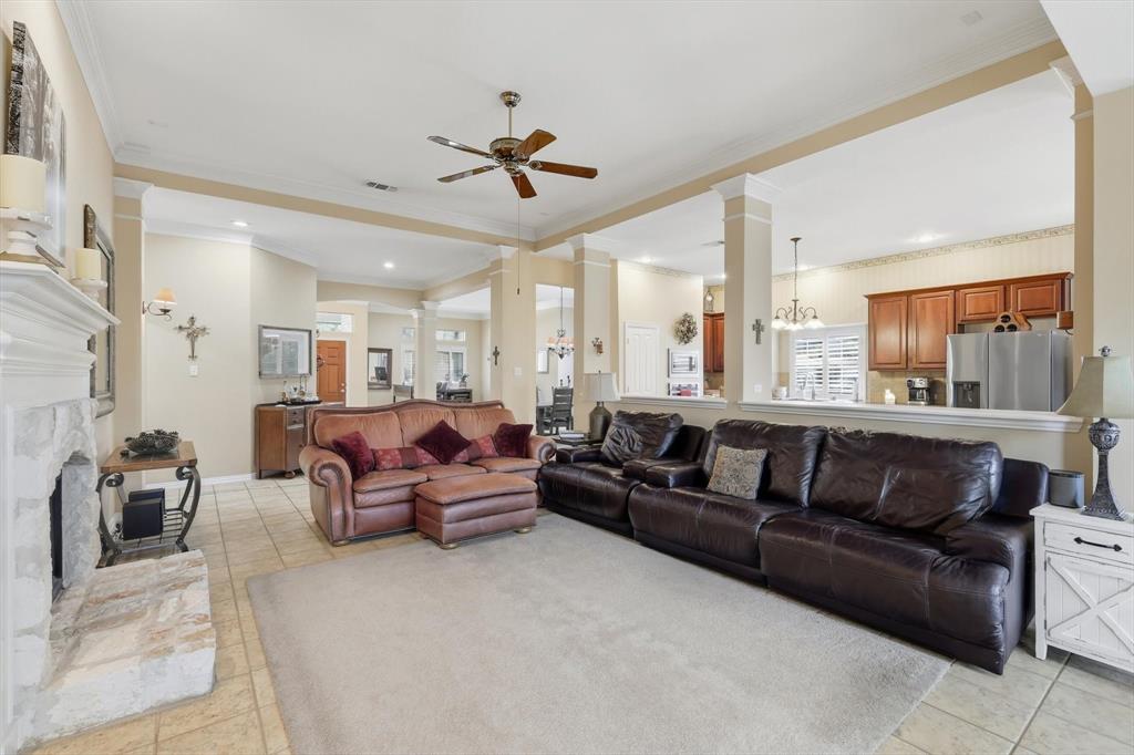 2012 Hayden Lane Corinth, TX 76210 - Photo 14 of 40 a living room with furniture and a large window