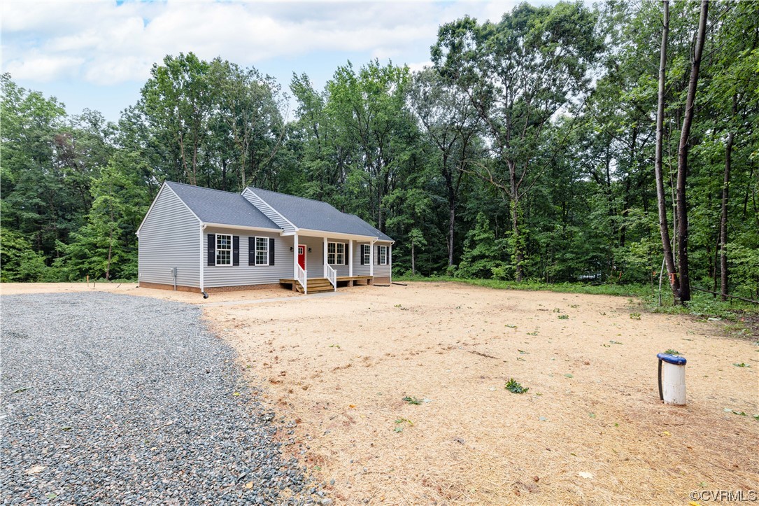 a house with trees in the background