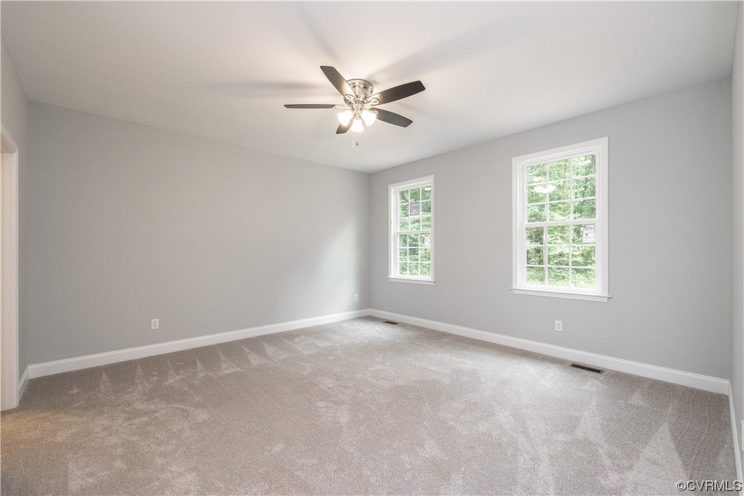 76 Trents Mill Road Cumberland, VA 23040 - Photo 14 of 36 a view of an empty room with a window