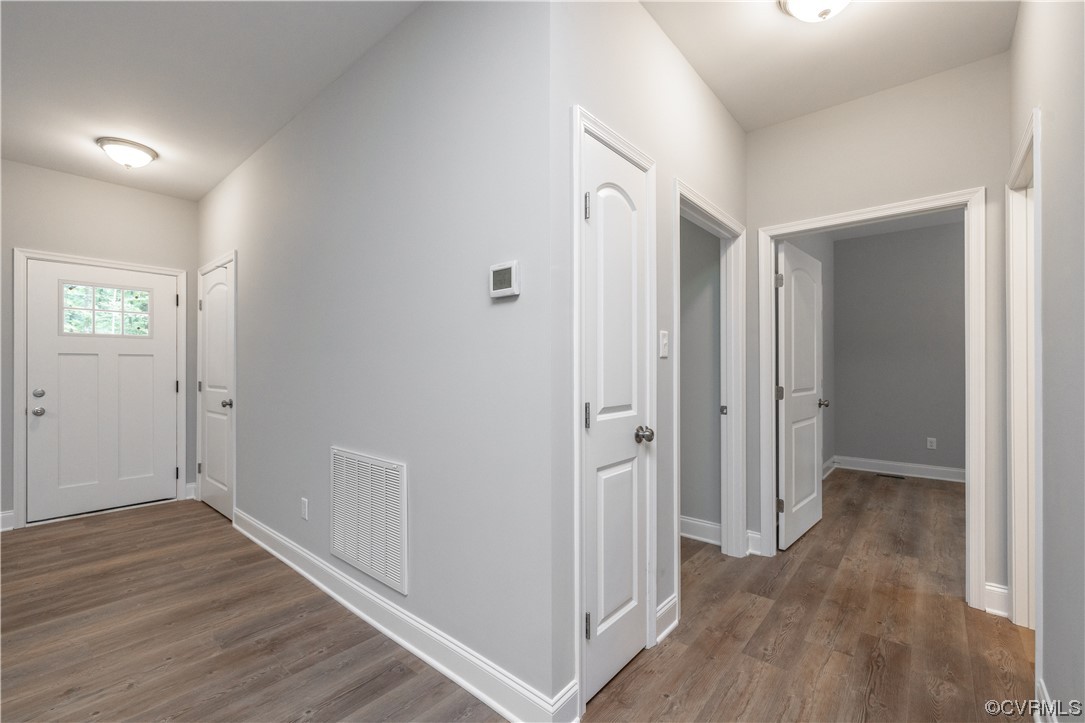 76 Trents Mill Road Cumberland, VA 23040 - Photo 20 of 36 a view of a hallway with wooden floor