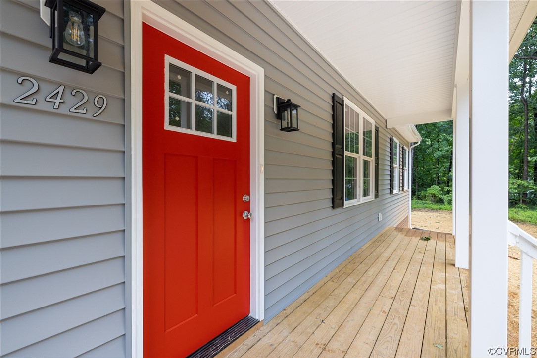 76 Trents Mill Road Cumberland, VA 23040 - Photo 3 of 36 a view of a house with a balcony