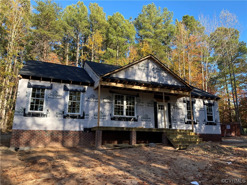 76 Trents Mill Road Cumberland, VA 23040 - Photo 32 of 36 a front view of a house with a yard balcony