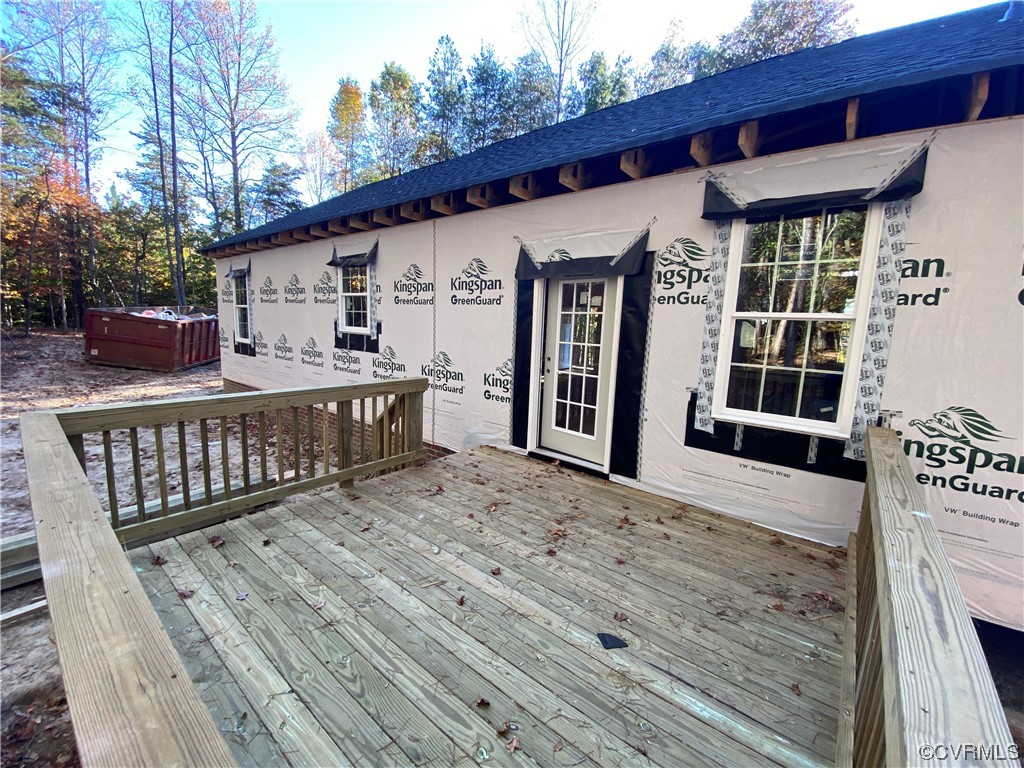 76 Trents Mill Road Cumberland, VA 23040 - Photo 36 of 36 a view of a house with wooden deck and furniture