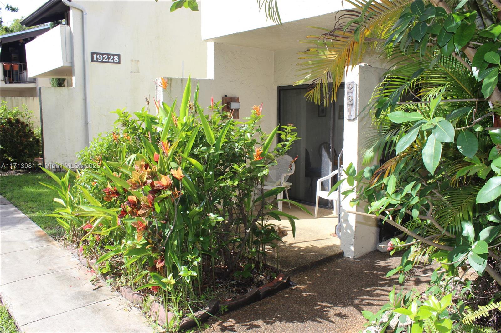 a view of a back yard of the house