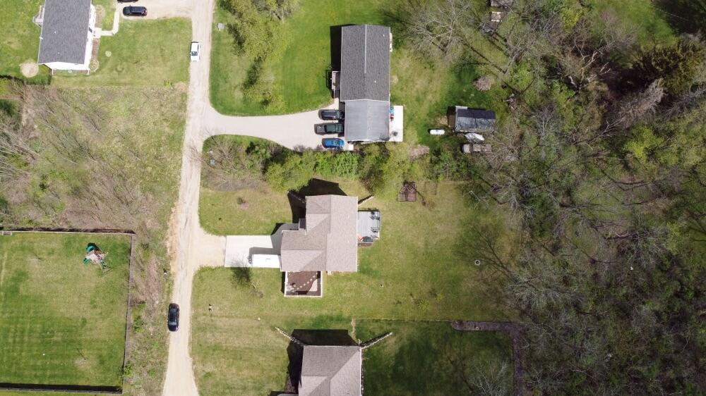 N2392 Mildred Street Delavan, WI 53115 - Photo 30 of 41 Large yard with wooded buffer for ultimate privacy