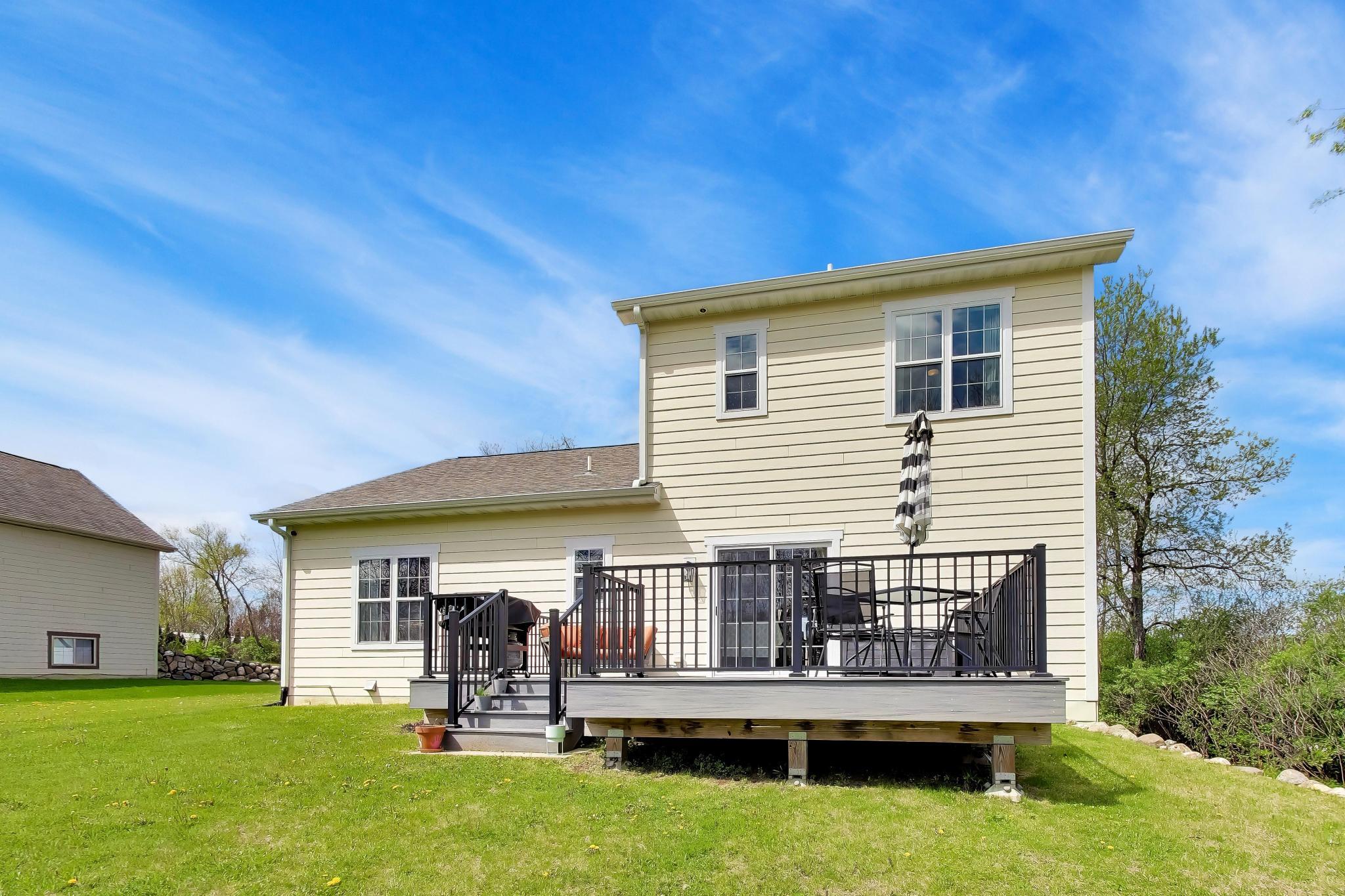 N2392 Mildred Street Delavan, WI 53115 - Photo 35 of 41 Enjoy sun from the yard and deck.