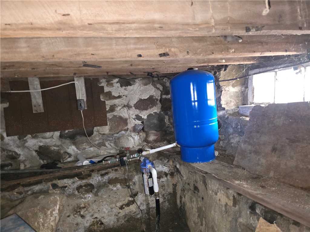457 Wolf Road West Alexandria, OH 45381 - Photo 26 of 28 This basement features a robust foundation, offering practical utility space.