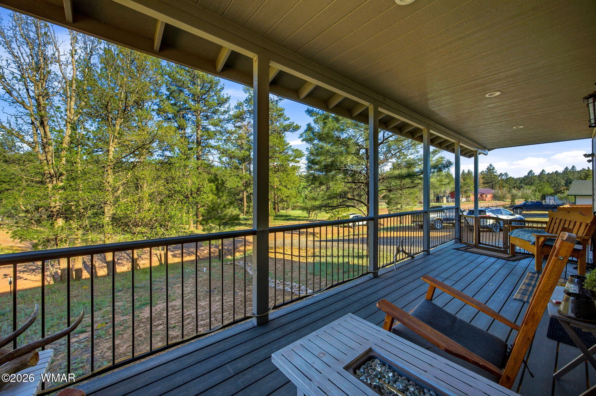 588 Rim Road Pinedale, AZ 85934 - Photo 29 of 30 a view of a balcony with wooden floor