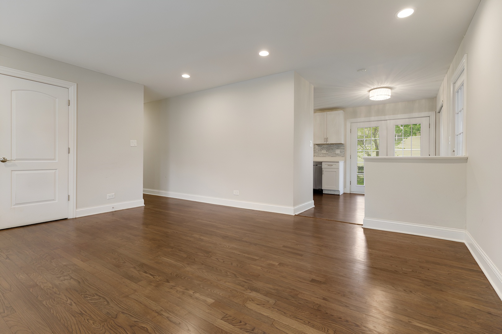 15303 Birch Road Markham, IL 60428 - Photo 6 of 20 a view of empty room with wooden floor and window