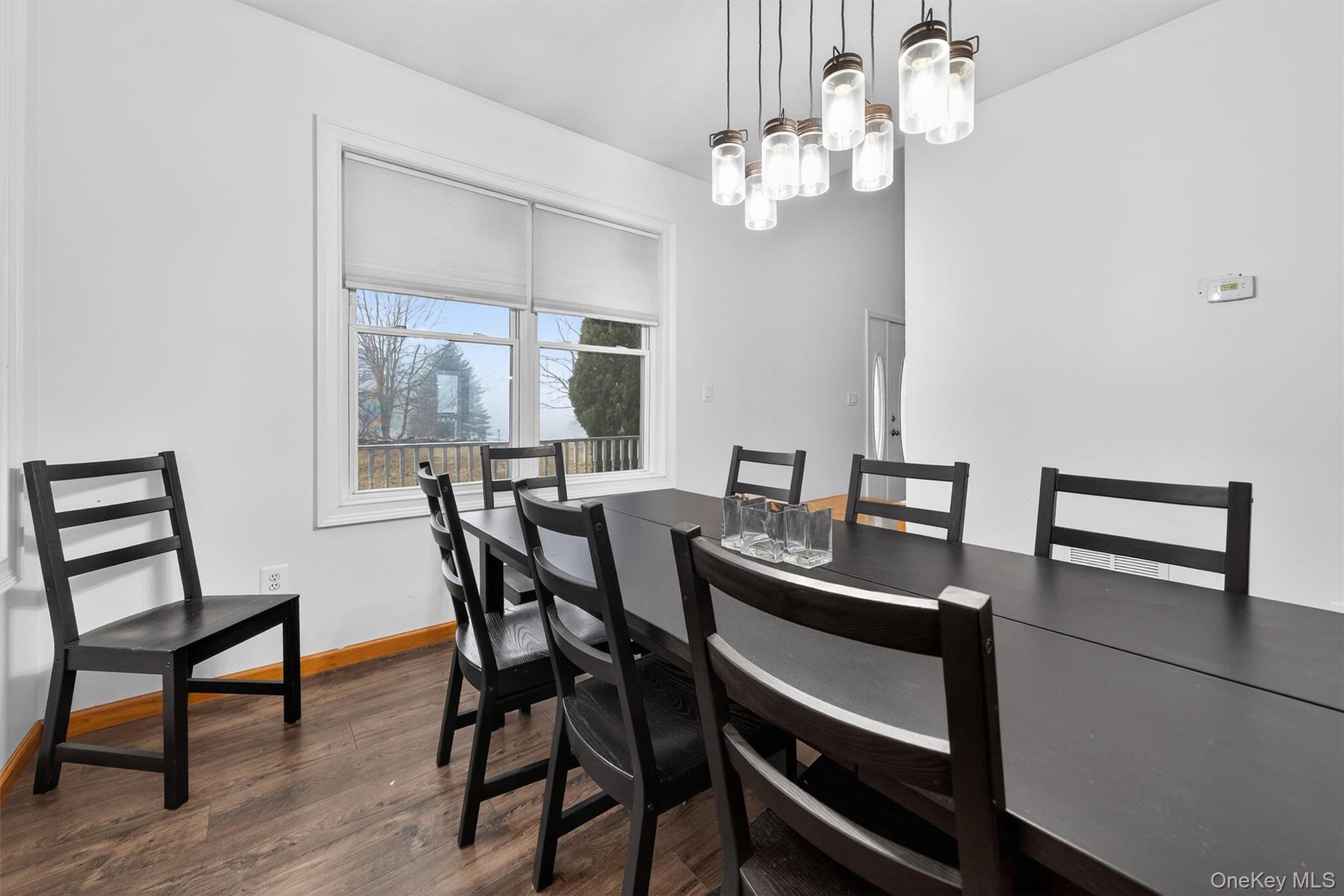 71 Eagle Crest Road Port Jervis, NY 12771 - Photo 12 of 45 Dining area with suspended lighting and dark wood finished floors