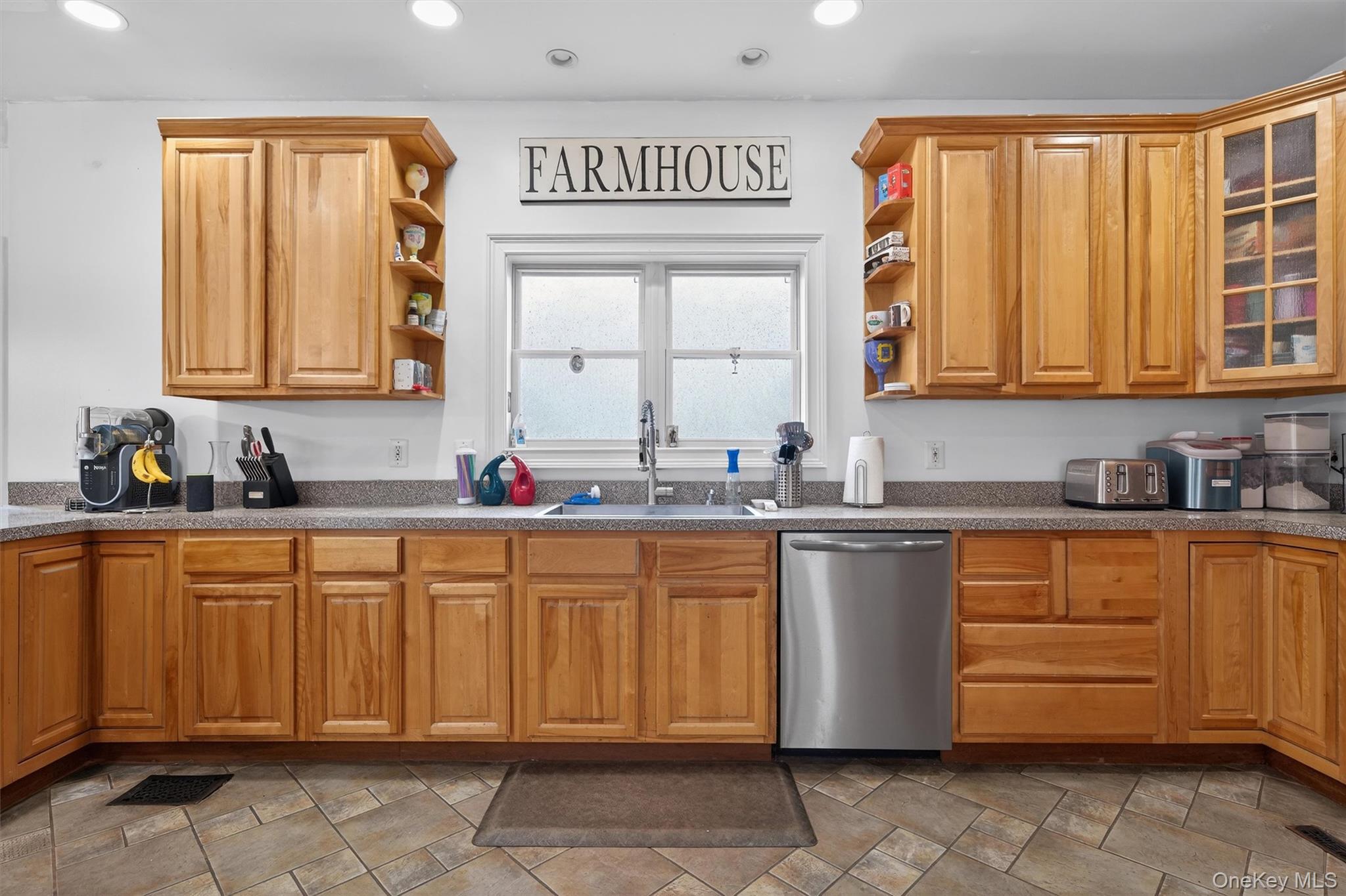71 Eagle Crest Road Port Jervis, NY 12771 - Photo 19 of 45 Kitchen featuring open shelves, stainless steel dishwasher, wood finish cabinets, recessed lighting, and glass fronted cabinets