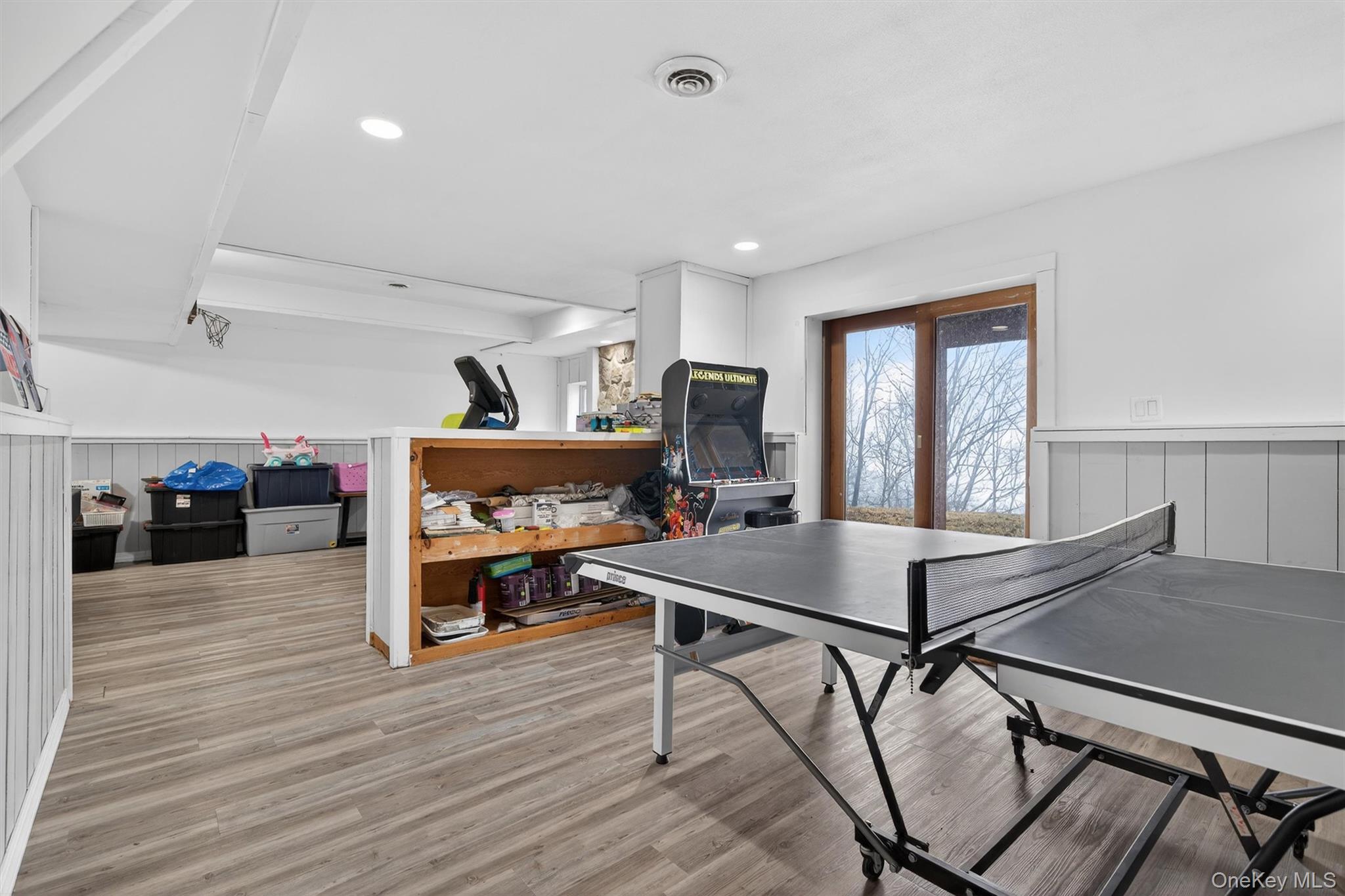 71 Eagle Crest Road Port Jervis, NY 12771 - Photo 35 of 45 Playroom featuring wainscoting, light wood-style flooring, and recessed lighting