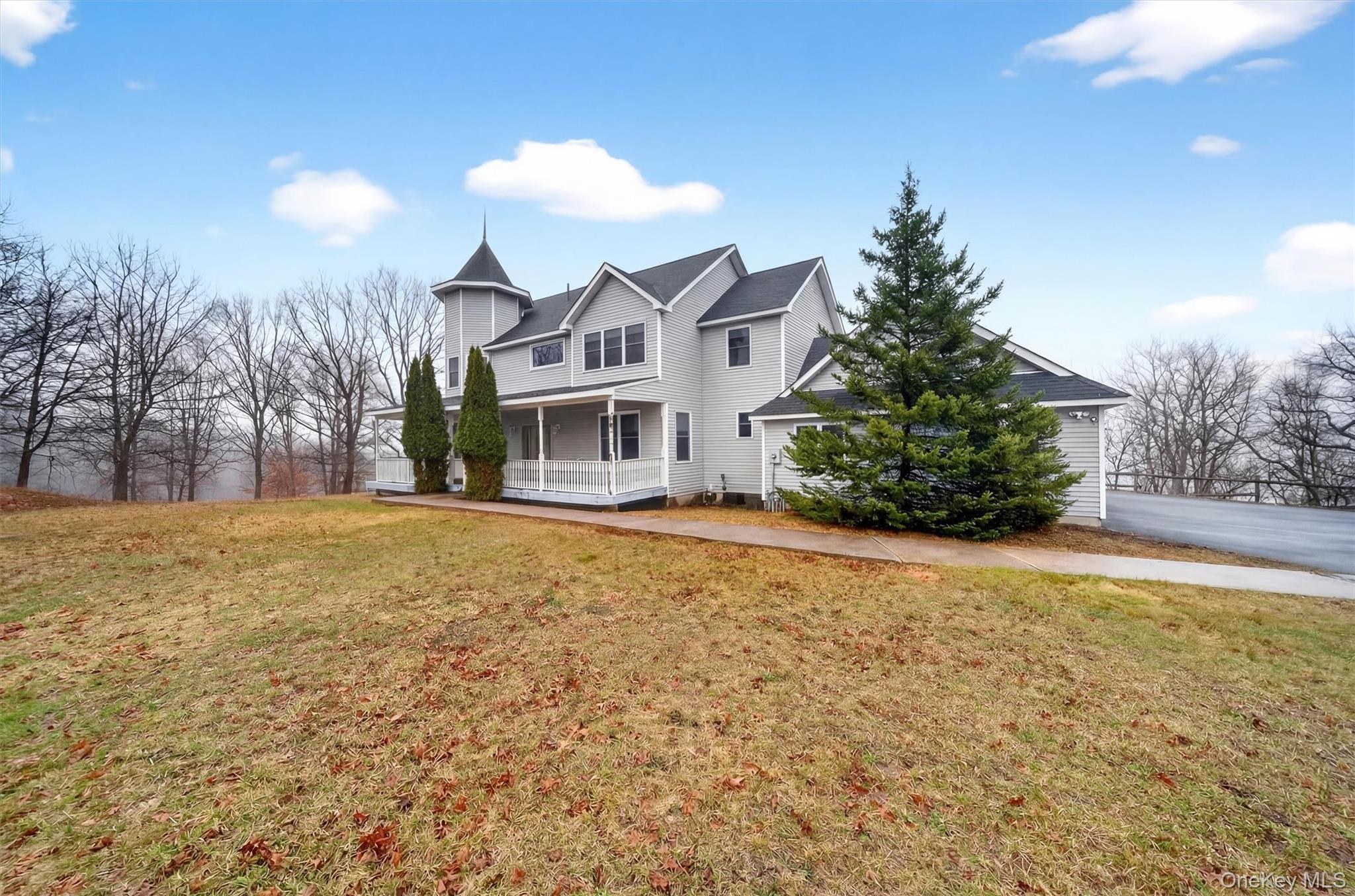 71 Eagle Crest Road Port Jervis, NY 12771 - Photo 4 of 45 View of front of home with covered porch and a front lawn