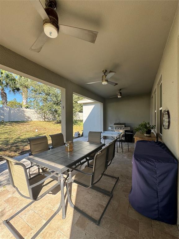 14645 Magnolia Ridge Loop Winter Garden, FL 34787 - Photo 18 of 20 a living room with furniture and a large window