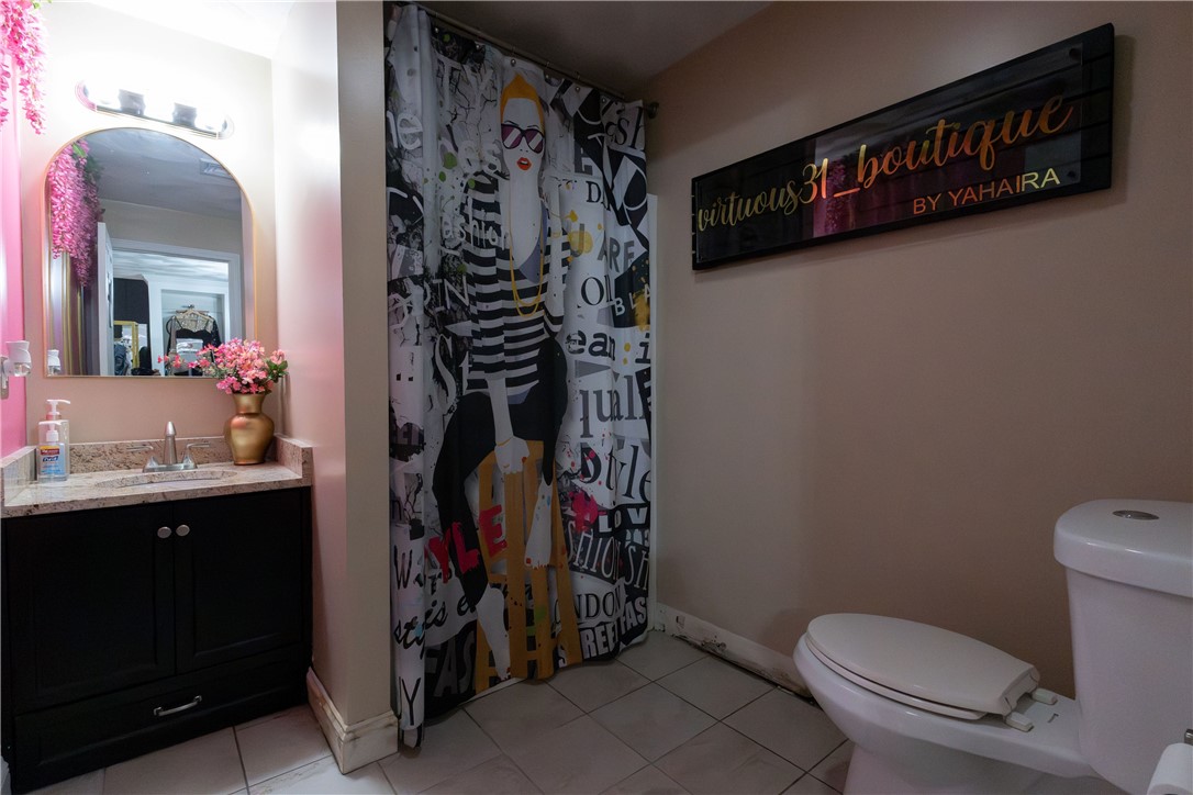 32 Dike Street Woonsocket, RI 02895 - Photo 12 of 20 Basement full bathroom featuring a walk-in shower.