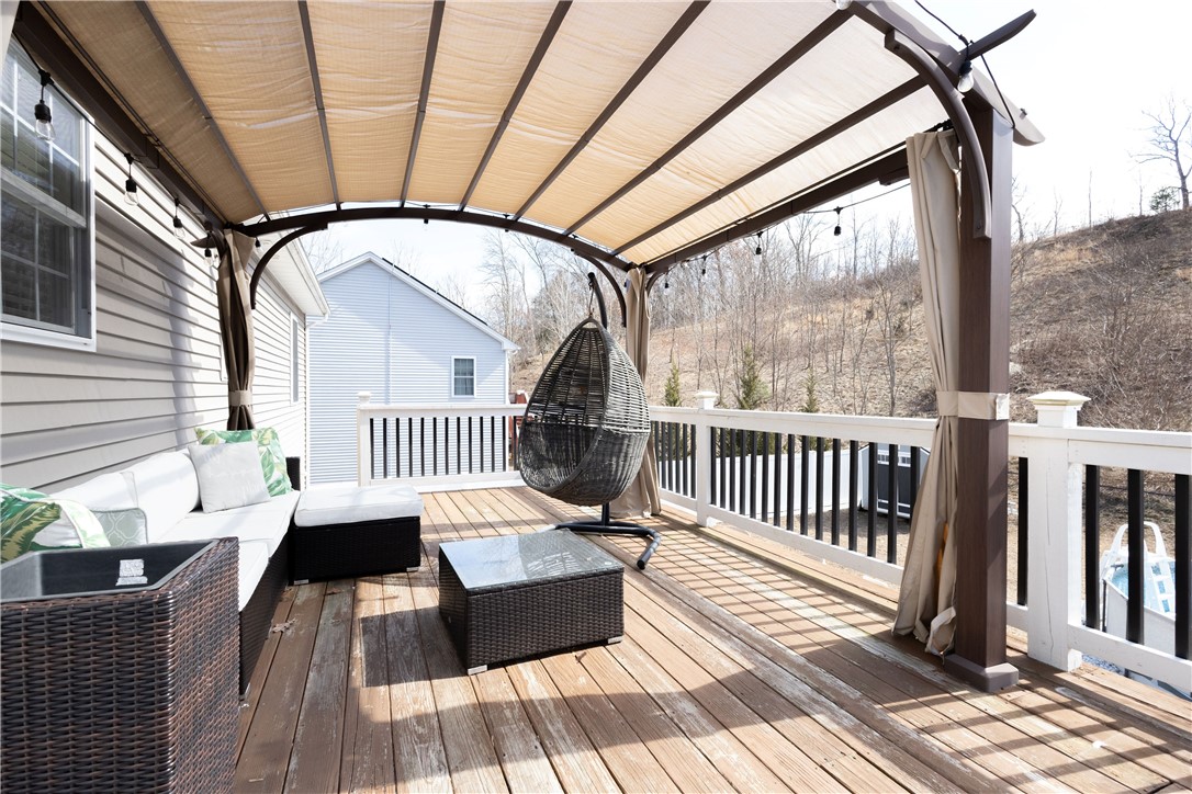 32 Dike Street Woonsocket, RI 02895 - Photo 13 of 20 Spacious deck conveniently located off the dining room, perfect for entertaining and outdoor dining.