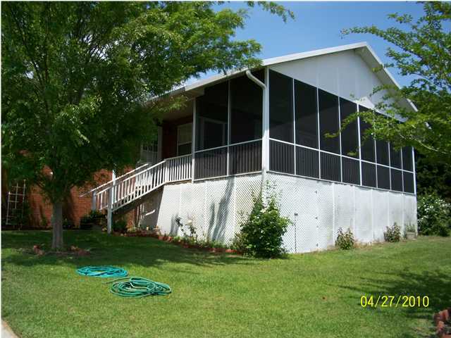 1584 Spring Lake Road DeFuniak Springs, FL 32433 - Photo 13 of 19 a view of a garden