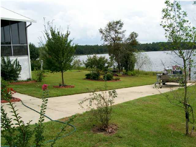 1584 Spring Lake Road DeFuniak Springs, FL 32433 - Photo 7 of 19 a view of a park with basketball court