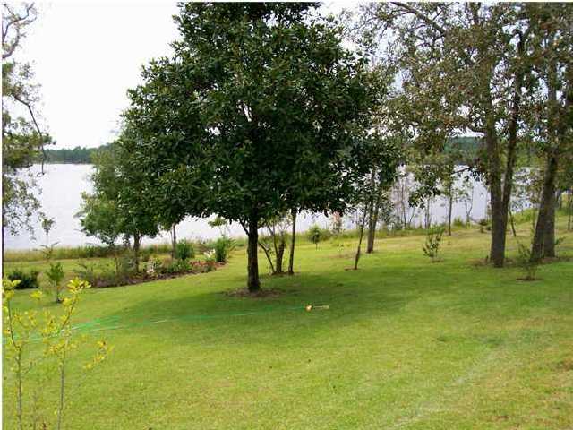 1584 Spring Lake Road DeFuniak Springs, FL 32433 - Photo 9 of 19 a view of field with trees