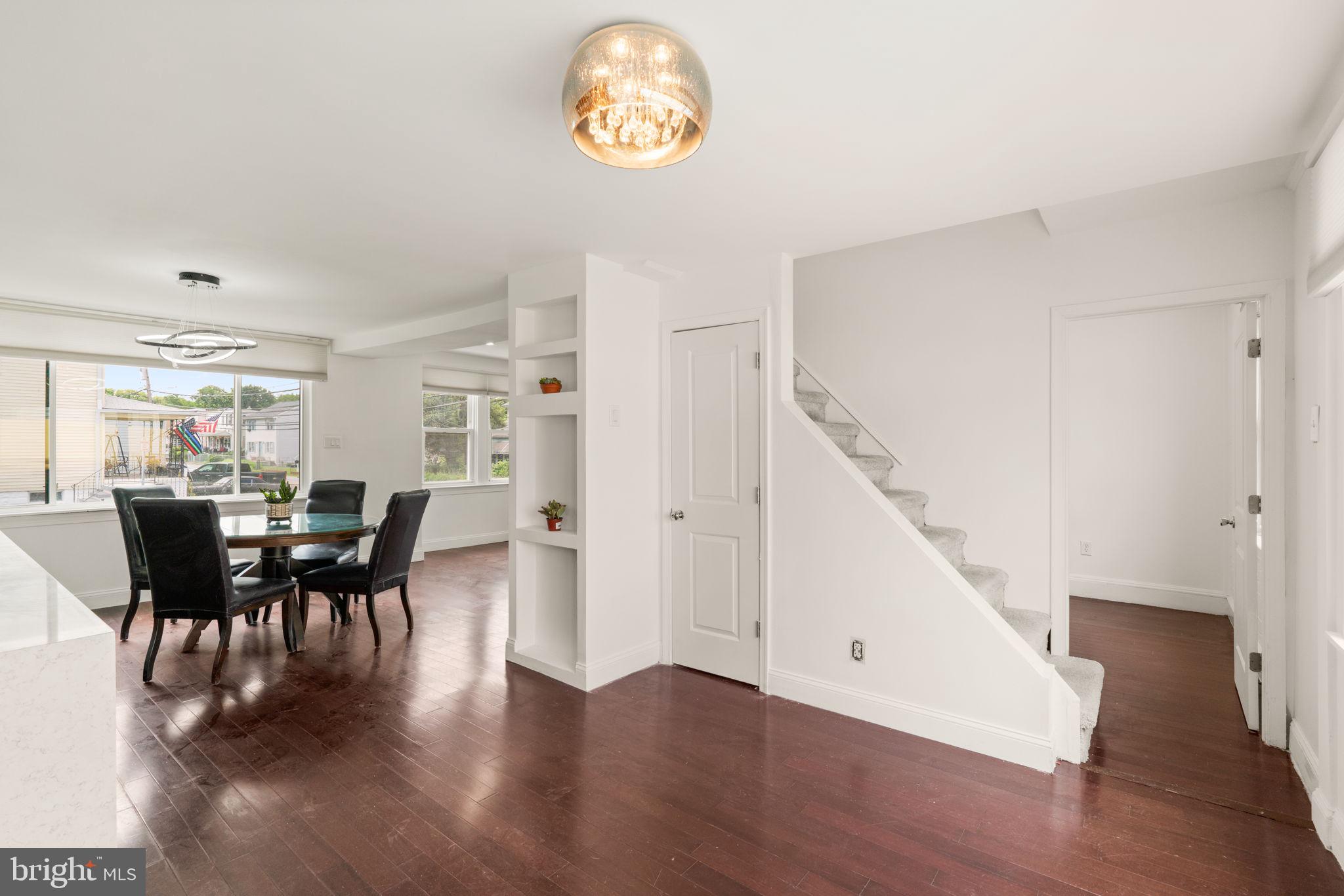 800 North Point Road Baltimore, MD 21224 - Photo 15 of 40 a view of a dining room with furniture window and wooden floor