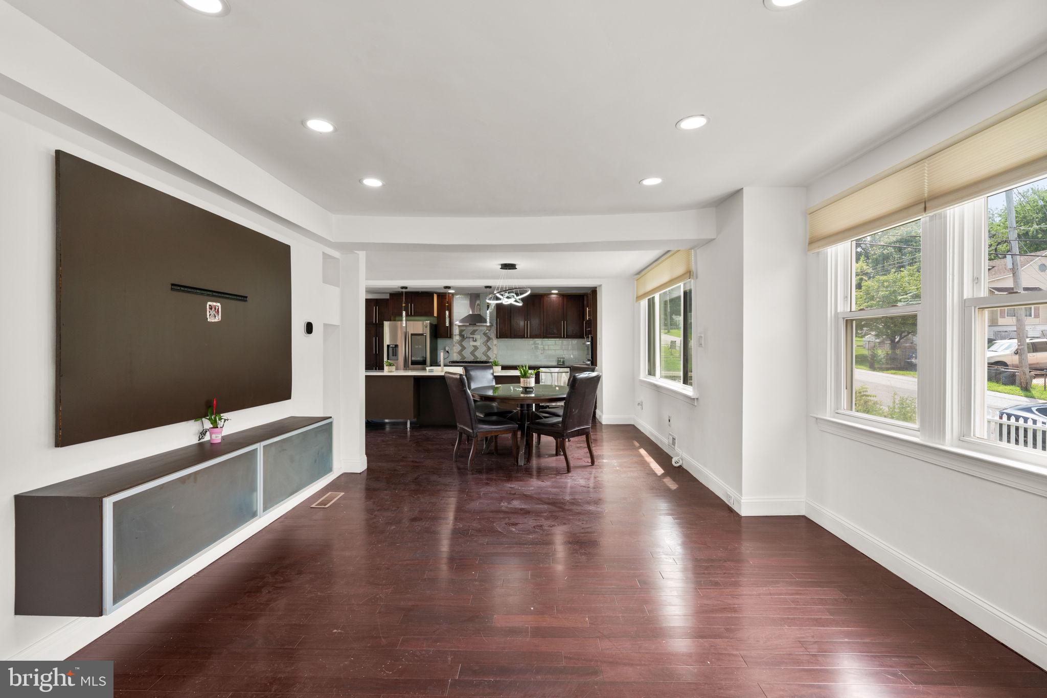 800 North Point Road Baltimore, MD 21224 - Photo 3 of 40 a view of a dining room with furniture window and wooden floor