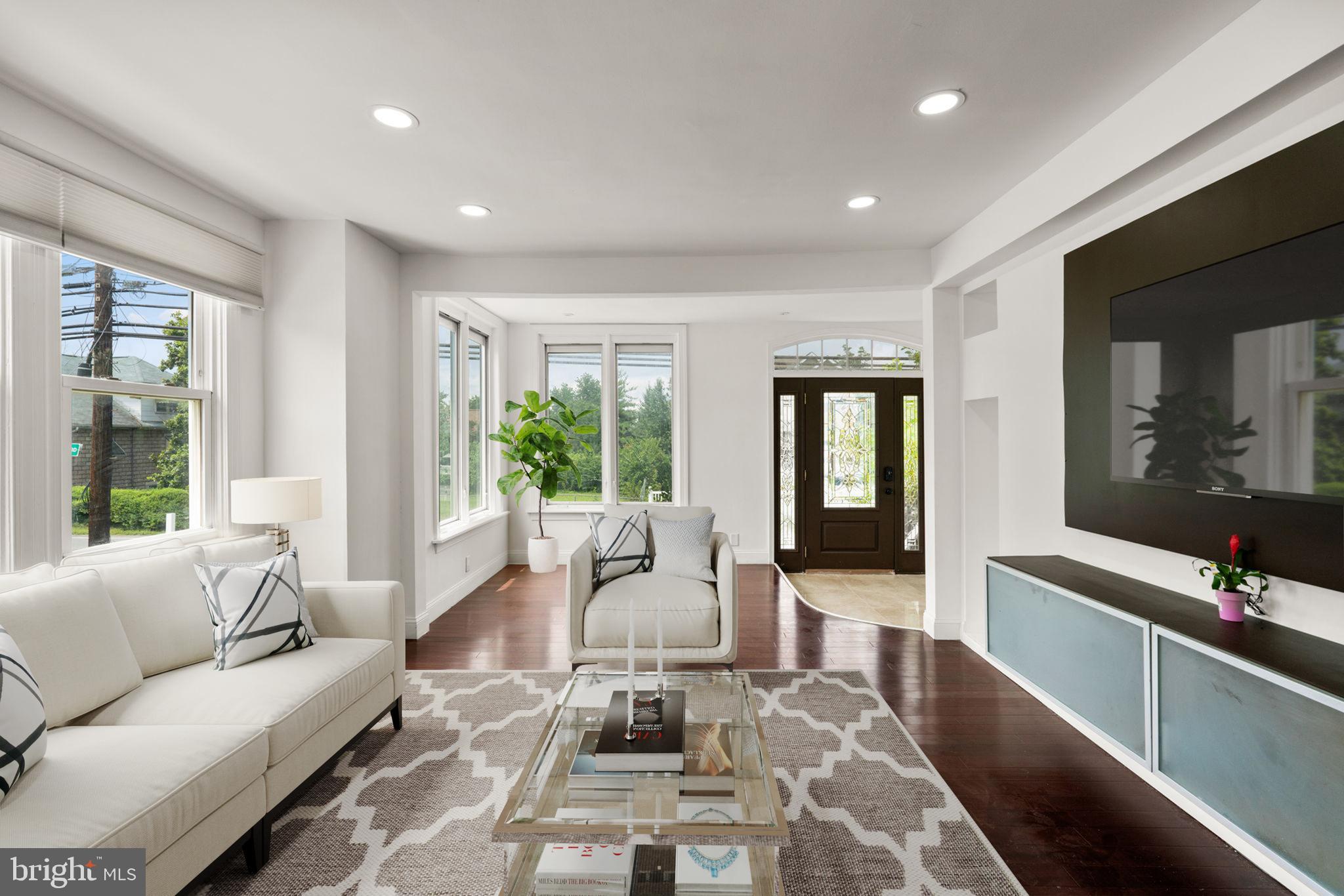 800 North Point Road Baltimore, MD 21224 - Photo 6 of 40 a living room with furniture and a large window
