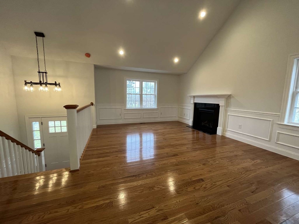 107 Putnam Hill Road Sutton, MA 01590 - Photo 3 of 21 a view of empty room with wooden floor
