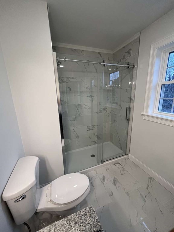107 Putnam Hill Road Sutton, MA 01590 - Photo 8 of 21 a bathroom with a toilet and a shower