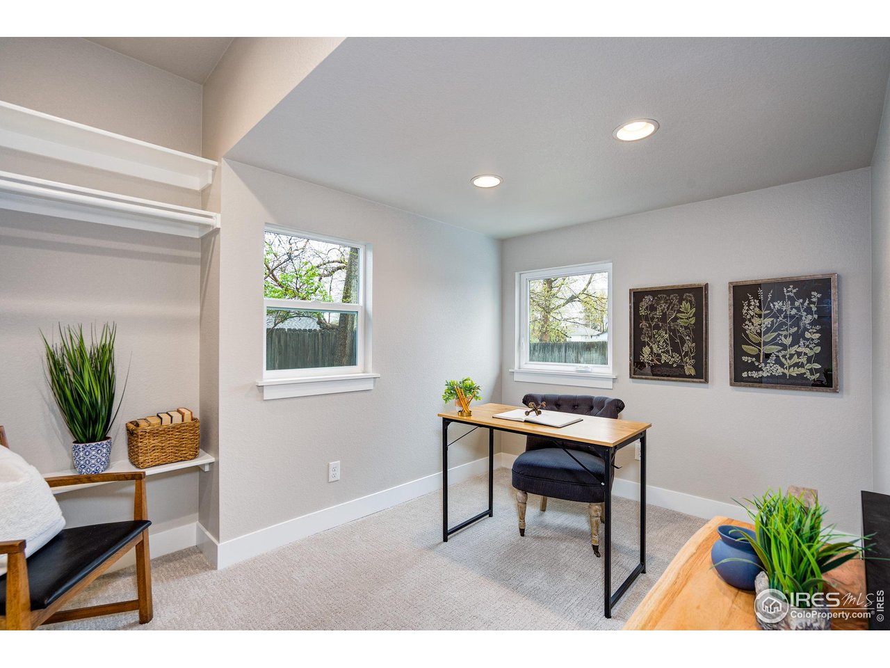 217 Locust Street Windsor, CO 80550 - Photo 23 of 40 a workspace with furniture and a potted plant