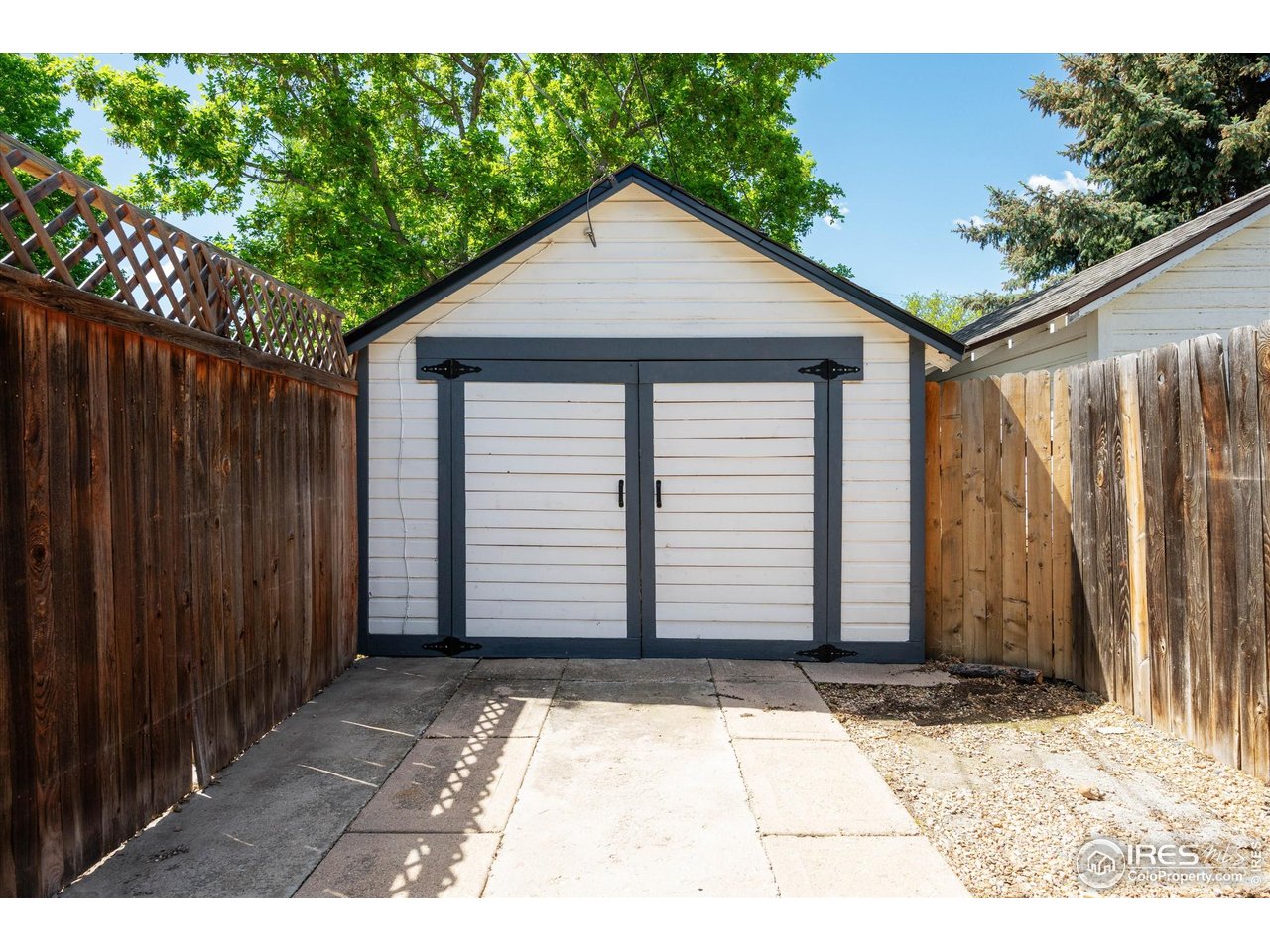 217 Locust Street Windsor, CO 80550 - Photo 36 of 40 a front view of house with garage