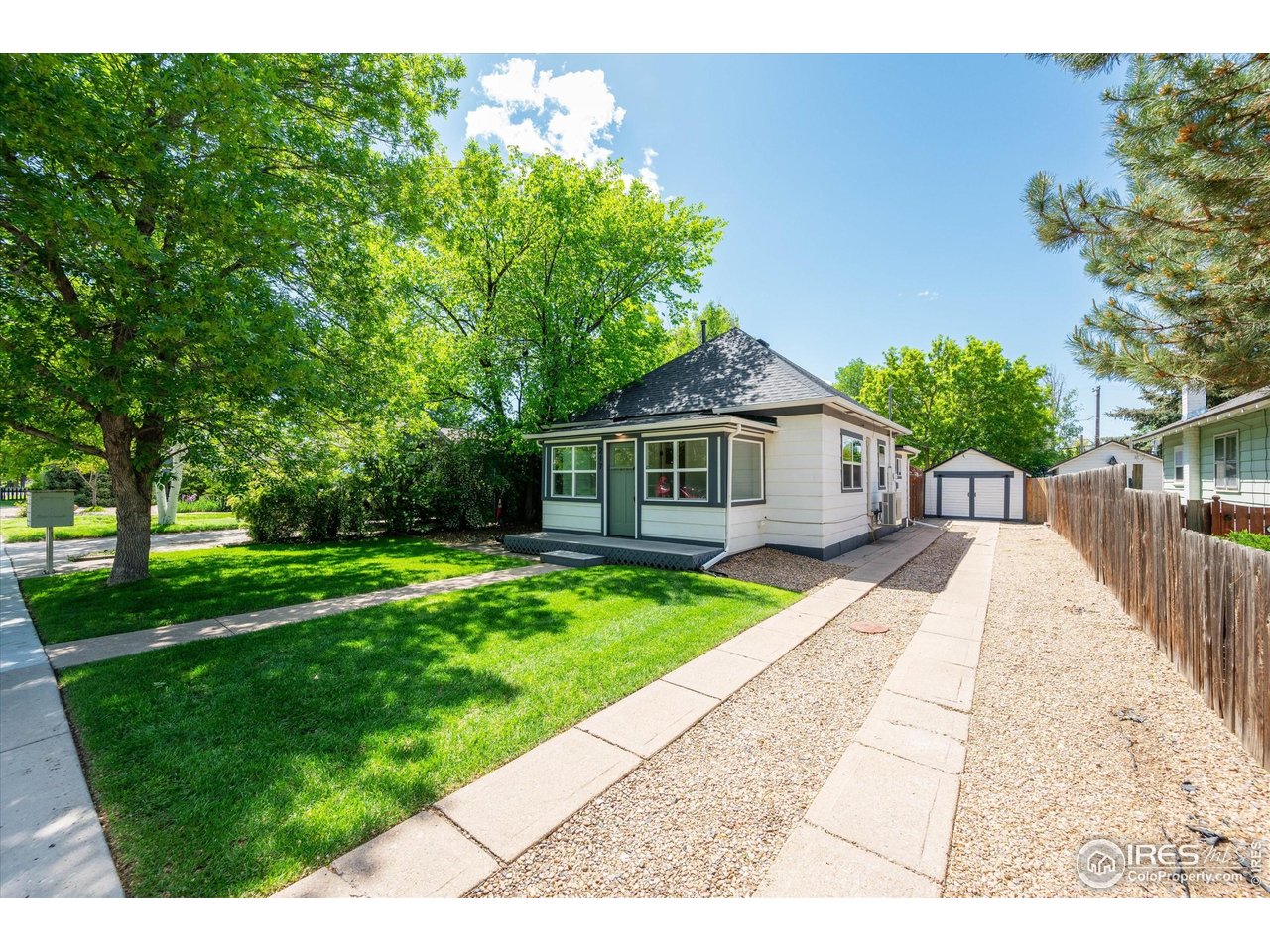 217 Locust Street Windsor, CO 80550 - Photo 40 of 40 a view of house with a yard