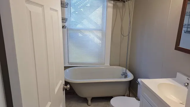 a bathroom with a sink and bathtub