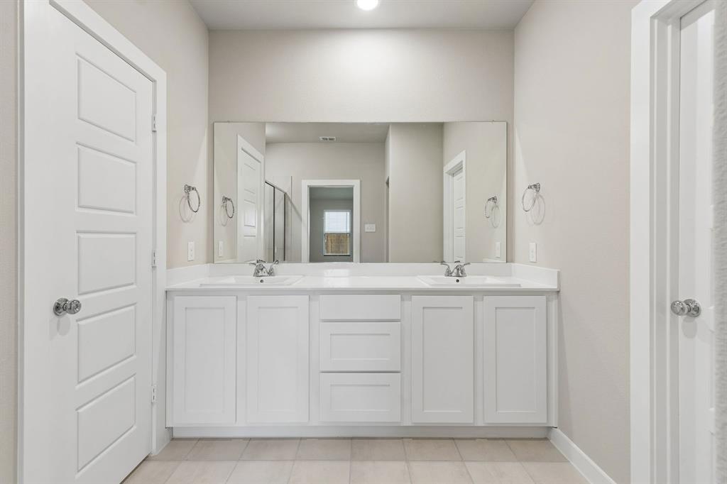 1124 Del Rio Drive Lavon, TX 75166 - Photo 18 of 32 Primary Bathroom in the Emmy II home plan by Trophy Signature Homes - REPRESENTATIVE PHOTO