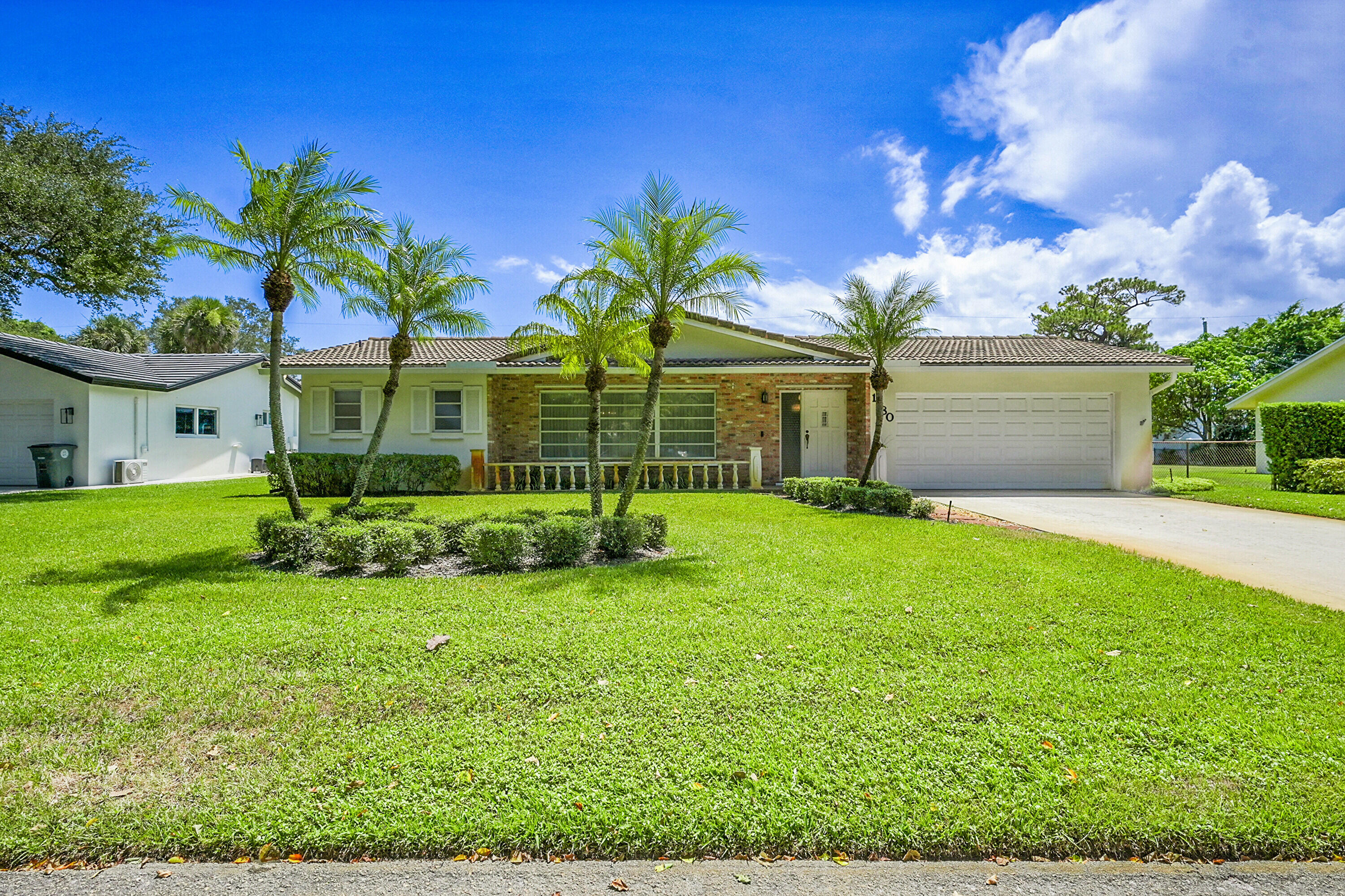 1180 Southwest 14th Drive Boca Raton, FL 33486 - Photo 1 of 42 Front