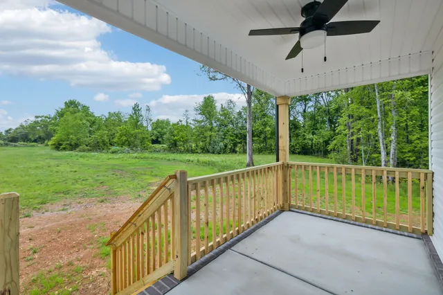 a view of a porch with a yard